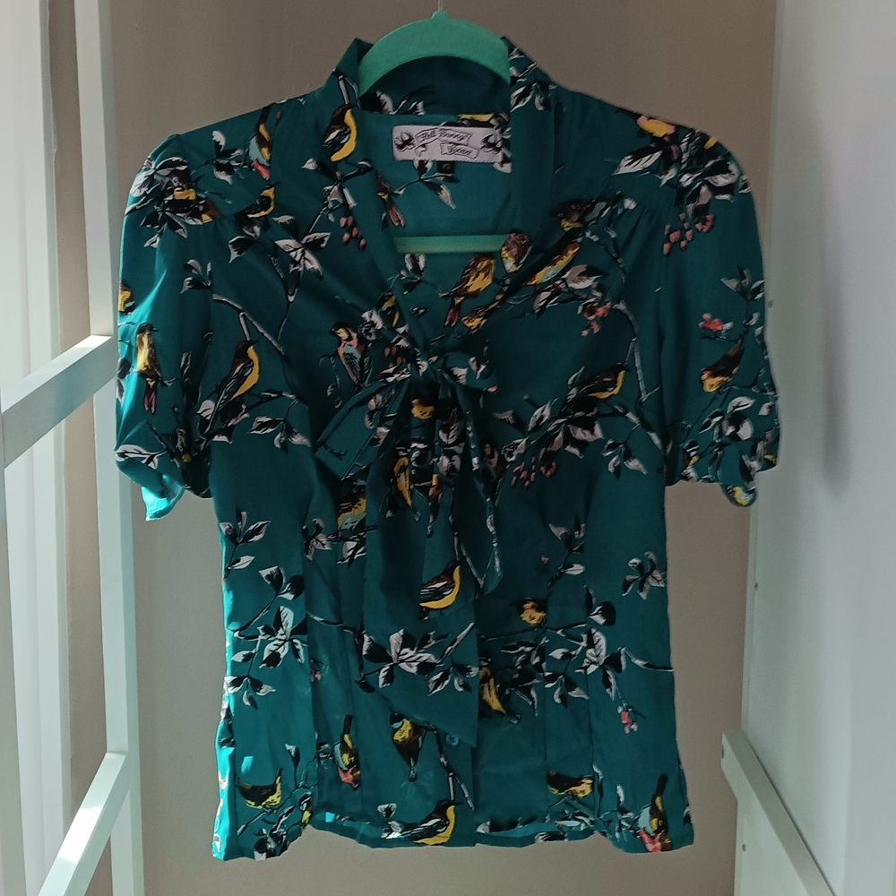 Hell Bunny Tie Neck Retro Bird Blouse In Teal, XS